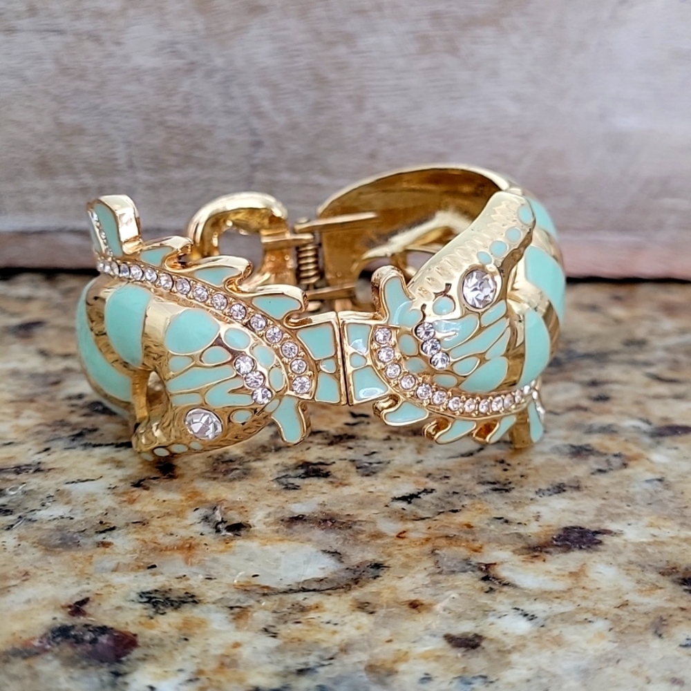 Seahorse mint enamel bracelet/cuff. Worn once. Like new